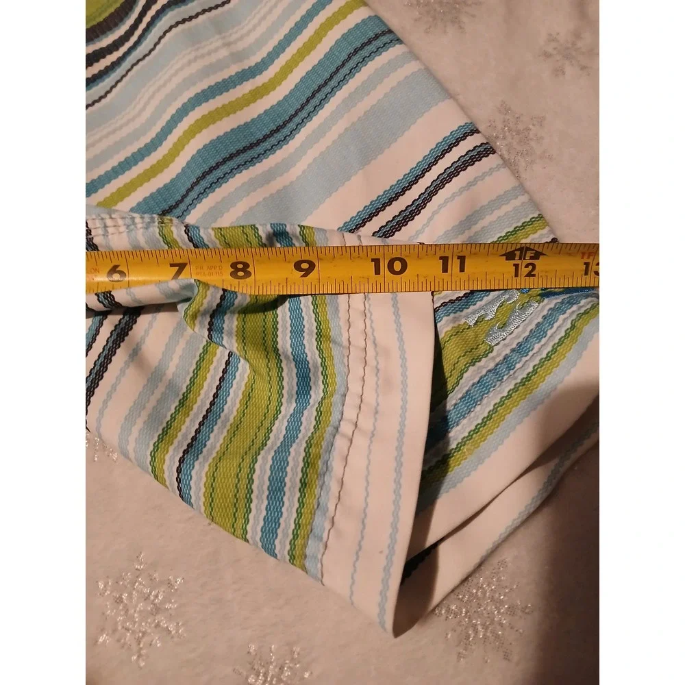 Billabong Board Shorts Size 30 with an attached fire starter and bottle opener